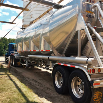 Dry bulk container at customer facility