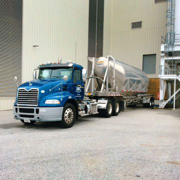 ABC Truck at customer facility loading dry materials
